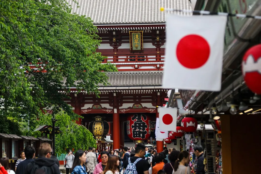 Golden hour illuminates Asakusa Temple as tourists respectfully navigate the bustling crowds, avoiding the initial rush hour chaos