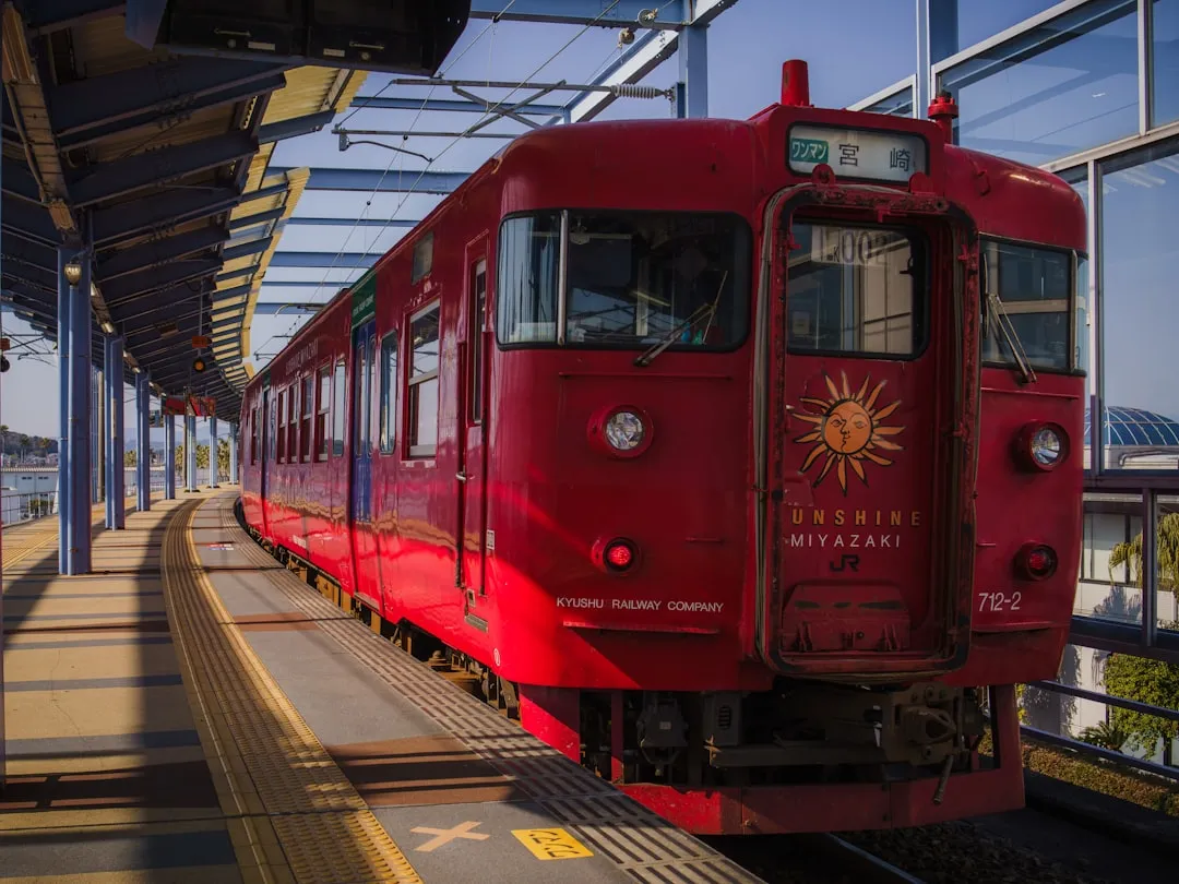 Vibrant, futuristic train platform in modern Japanese city, capturing seamless travel through the city.